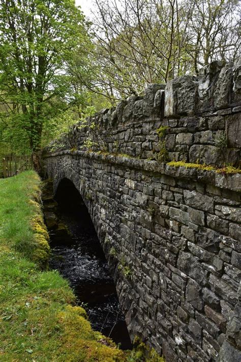 Old Historic Stone Bridge With An Arch Stock Image Image Of Woodlands