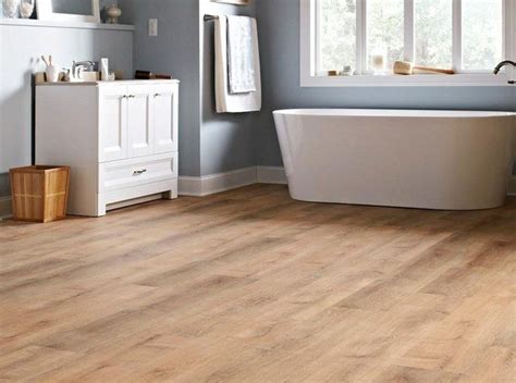If the wood flooring runs perpendicular to the transition, it can be hard to just break off the pieces of flooring and not look attractive. Pin on Flooring over tile