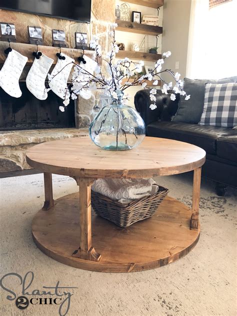 This unique crate storage coffee table and stools are perfect for keeping your living room organized with style statements in check. DIY Round Coffee Table - Shanty 2 Chic