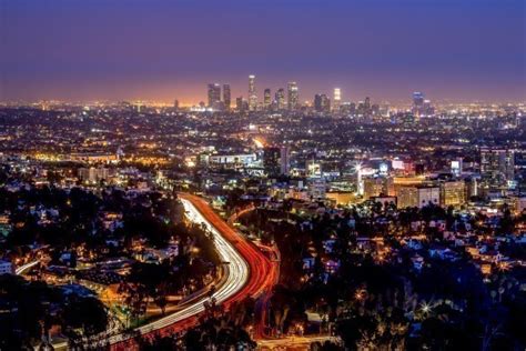 Los Angeles Downtown And Hollywood Skyline At Night Purple Colours