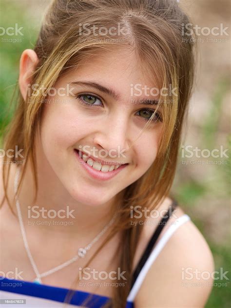 Pretty Teenage Girl Smiling Stock Photo Download Image