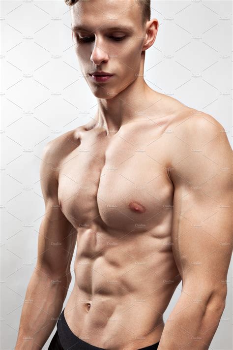 Young Man With A Muscular Torso Containing Male Torso And Fitness