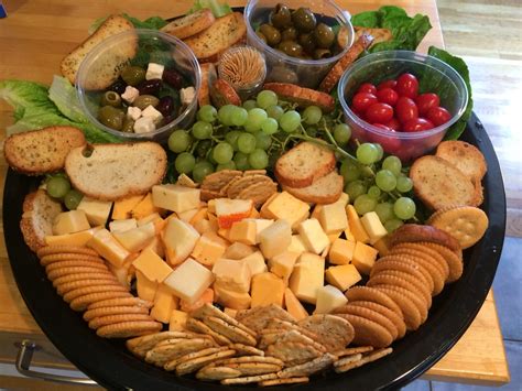 Andre cow cheese, dried fruit mix, roasted grape. Party cheese platter made at home | Party cheese platter ...