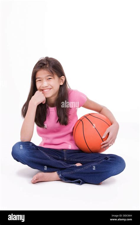 Girl Sitting On Basketball Cut Out Stock Images And Pictures Alamy