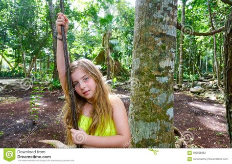 Caucasian Girl Playing In Rainforest Jungle Stock Photo Image Of