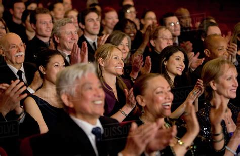 Clapping theater audience - Stock Photo - Dissolve