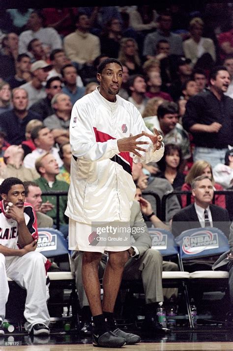 Scottie Pippen Of The Portland Trail Blazers Looks On From The News