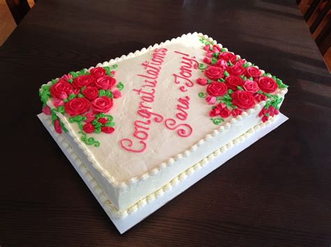 Buttercream On Yellow Half Sheet Cake With Strawberry Filling