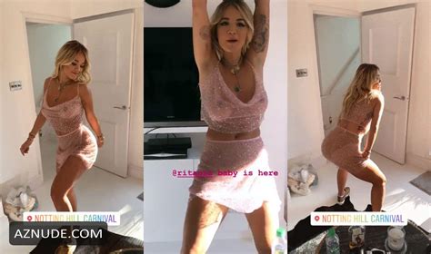 rita ora displays her dancing skill posing in a see through outfit showing off her boobs and