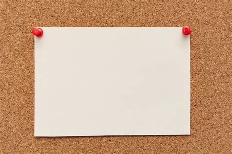 Premium Photo Stripped Note Paper With Push Pins On Cork Board