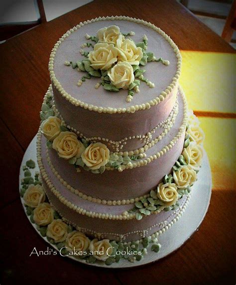 Classic buttercream with a twist wedding cake. Lavender wedding cake with white roses - all buttercream ...