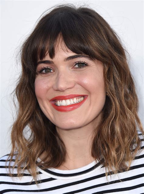 A textured full fringe adds lift, while layered side celebrity inspiration: 20 Must-Try Curly Hairstyles for Round Faces