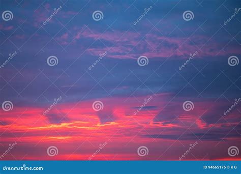 Bright Dramatic Sunset Or Sunrise With Fire Red And Purple Color Stock