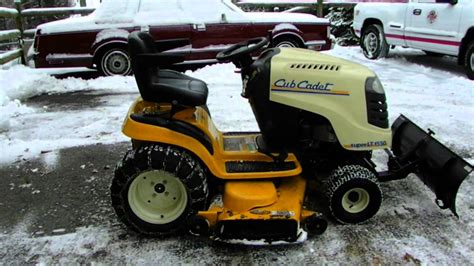 How To Plow Your Driveway With A Lawn Tractor With A Snow Plow Youtube