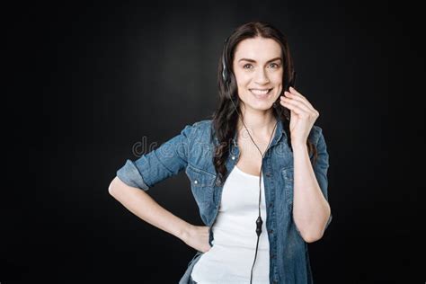 Attractive Female Wearing Earphones With Microphone Stock Photo Image