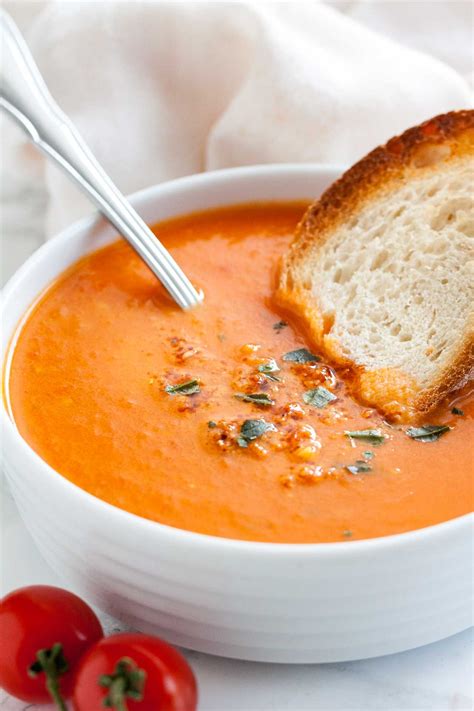 a creamy and healthy roasted tomato soup that s loaded with fresh flavors and super easy to