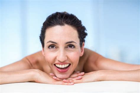Smiling Brunette Relaxing On Massage Table Stock Image Image Of Beautiful Female