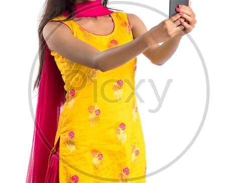 Image Of Young Indian Girl Or Woman Taking Selfie With A Smartphone On