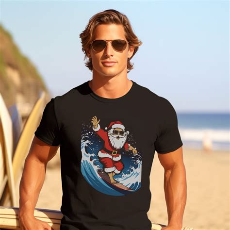 Santa Claus Riding A Wave On A Surfboard T Shirt Santa Claus Surfing Shirt Funny Christmas