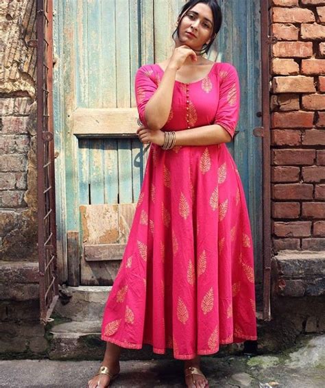 golden leaf printed kurti fashion photography poses girl poses fashion poses