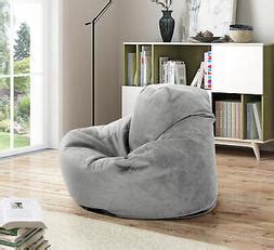They're lightweight, they're portable, they're inexpensive, they're somewhat oftentimes covered in a heinous vinyl fabric in an equally atrocious color, bean bag chairs —despite being fixtures in dorm rooms for decades. Bean Bag Comfy Chair Dorm Teen Kids Room