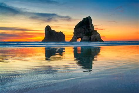Sunset At Wharariki Beach New Zealand Stock Photo Download Image Now