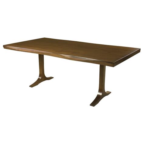 A Solid Maple Sculpted Edge Dining Table With A Solid Wood Modern