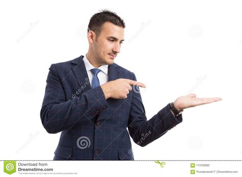 Young Handsome Salesman Or Businessman Pointing To An Option Stock