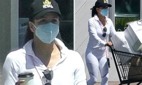 Eva Longoria Slips Into Sleek White Workout Gear And Mask As She Stocks
