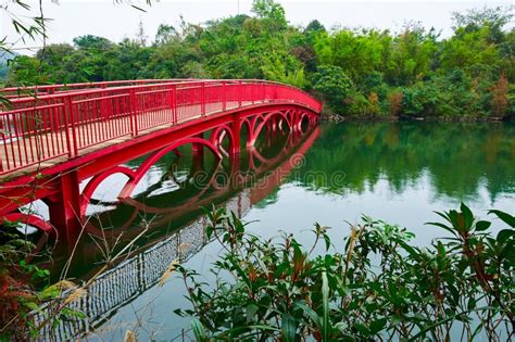 The Red Bridge And Lake Stock Photo Image Of Dwellings 90769018