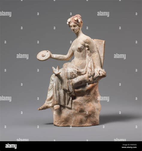 Terracotta Statuette Of Aphrodite Seated On A Rock Period Hellenistic Date Rd Century B C