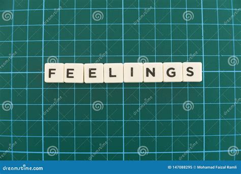 feelings word made of square letter word on green square mat background stock image image of