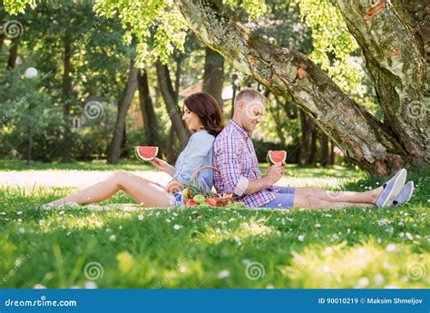 attractive couple having a romantic picnic in the park stock image image of garden food
