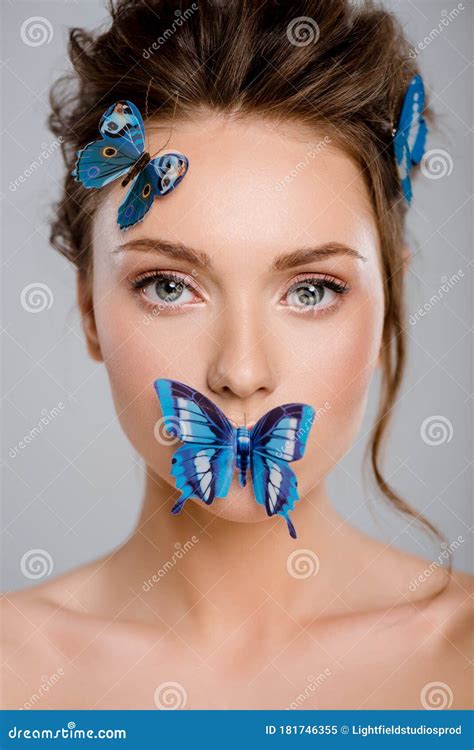 Beautiful Young Woman With Decorative Butterflies On Face Stock Image