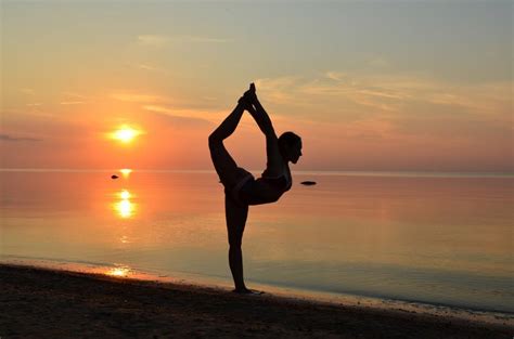 Browse our extensive yoga pose library, with a vast collection of everything from basic to advanced poses, seated and standing poses, twists, challenge poses, and bandha techniques. Beach Yoga Pose- In Sand At Sunset Photo | Image Finder