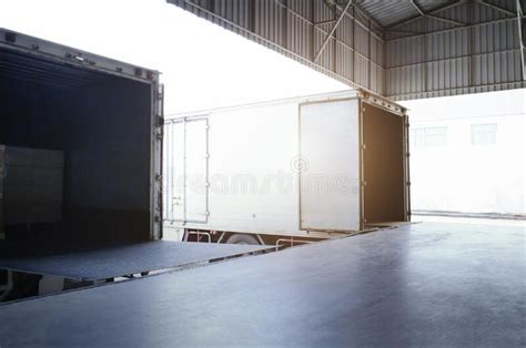 Cargo Container Trucks Parked Loading Dock At Distribution Warehouse