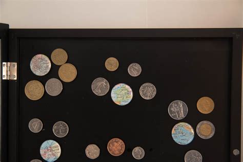 Display Foreign Coins In A Simple Shadowbox To Showcase Your Travels
