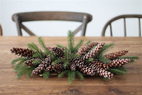 5 minute diy christmas centerpiece with pinecones and berries