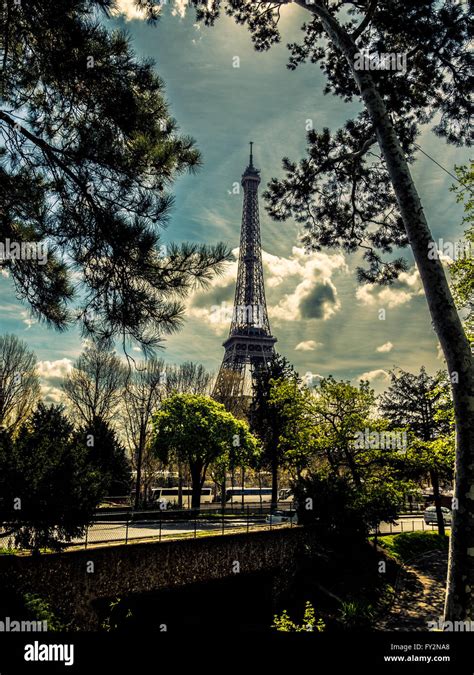 Eiffel Tower Seen Through Trees Paris France Stock Photo Alamy