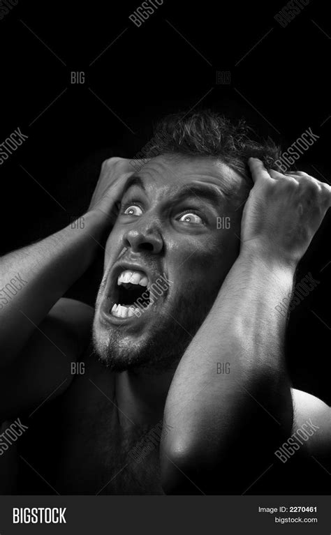 Man Screaming In Pain And Agony Image And Stock Photo 2270461