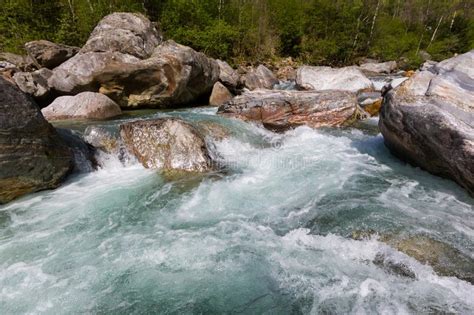 Colorful Verzasca Valley With Green River Water In Spring Blue Sky