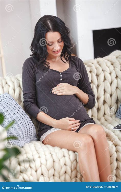 Happy Beautiful Pregnant Woman Relaxing On Sofa Stock Image Image Of Caucasian Expecting