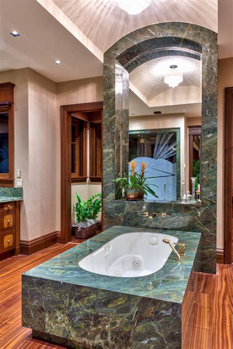 Rustic Master Bathroom With Green Marble Bathtub Surround