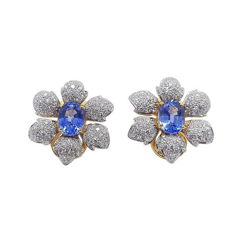 Blue Sapphire With Diamond Flower Earrings Set In Karat Gold