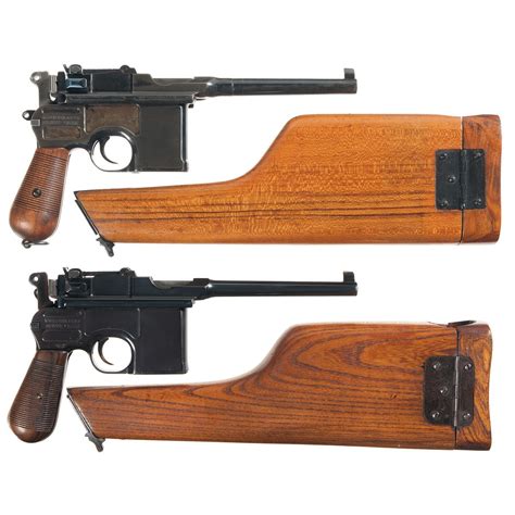 Two Mauser Broomhandle Semi Automatic Pistols With Shoulder Stocks A