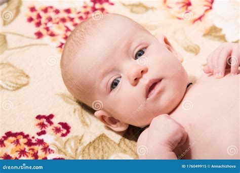 Portrait Of Baby Awake Looking At The Camera Stock Image Image Of