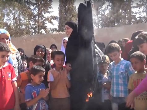 Syrian Women Burn Burqas In Celebration After Being Freed From Isis
