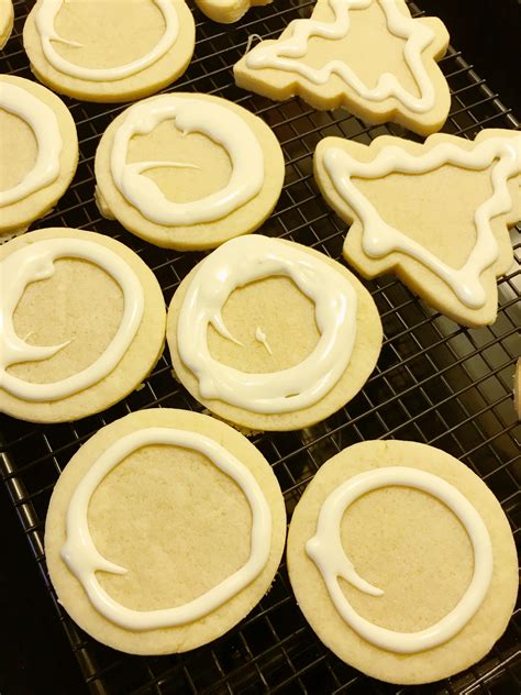 Snip off the end of the bag and pipe a small dot of frosting onto the back of each candy eye. Santa's Favorite Cookies - Christmas Lights Sugar Cookies ...