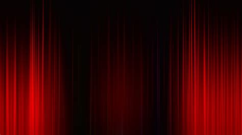 rojo rayos resplandor abstracto fondo negro avance