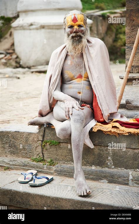 a sadhu ascetic religious man usually a yogi poses for photos at pashupatinath temple